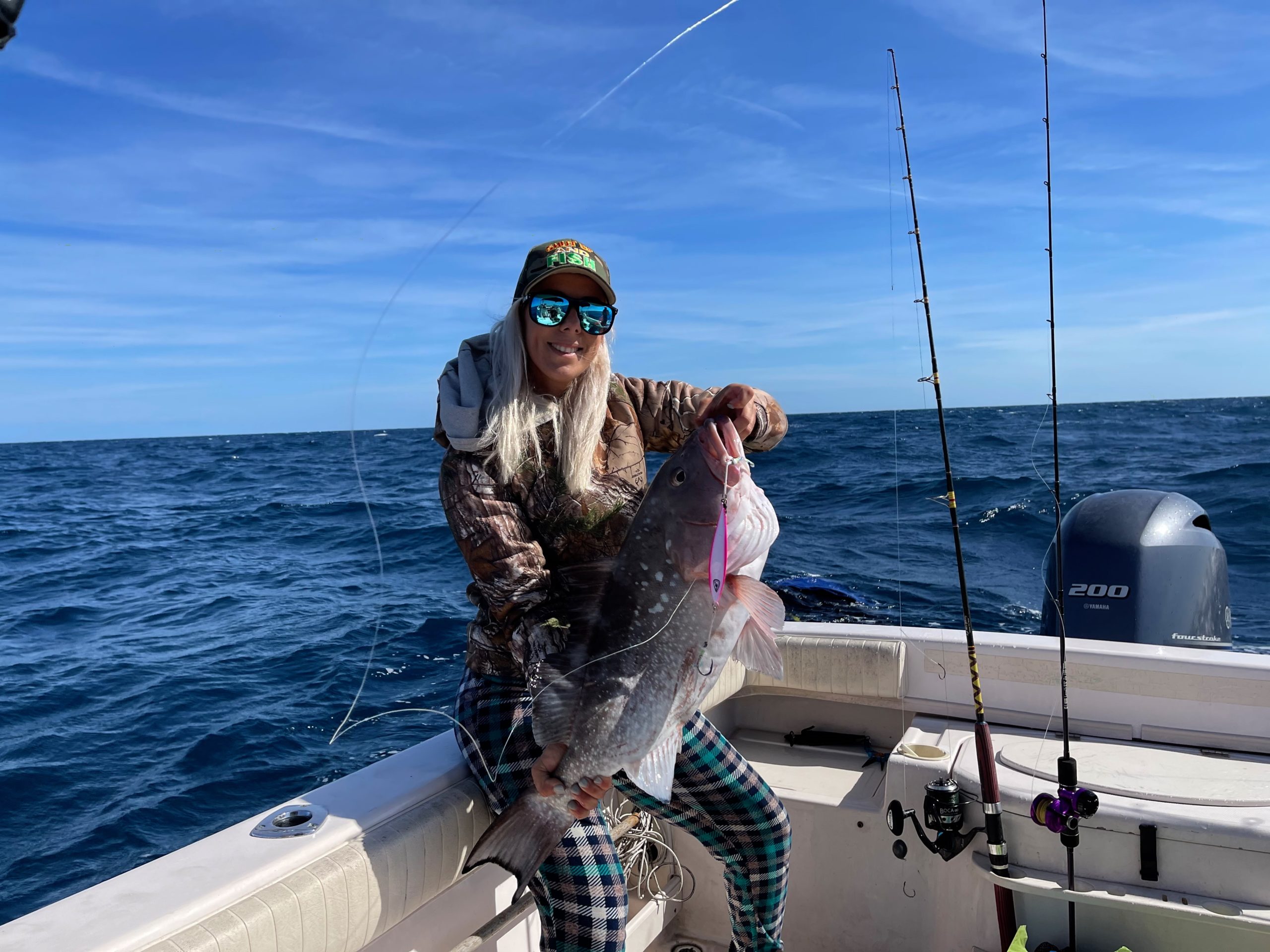 Slow Pitch Jigging Red Grouper Offshore Fishing Charter Venice, FL