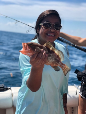 Kids fishing for Red grouper Offshore fishing charter Venice, FL