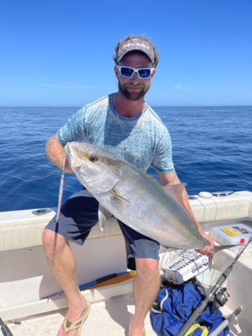 Fast jigging for Amberjack Offshore fishing charter Venice, FL